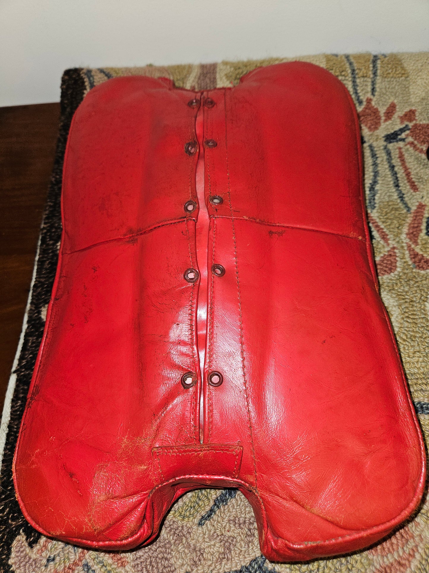 Antique Egyptian Camel Saddle / Stool With Red Leather Seat.